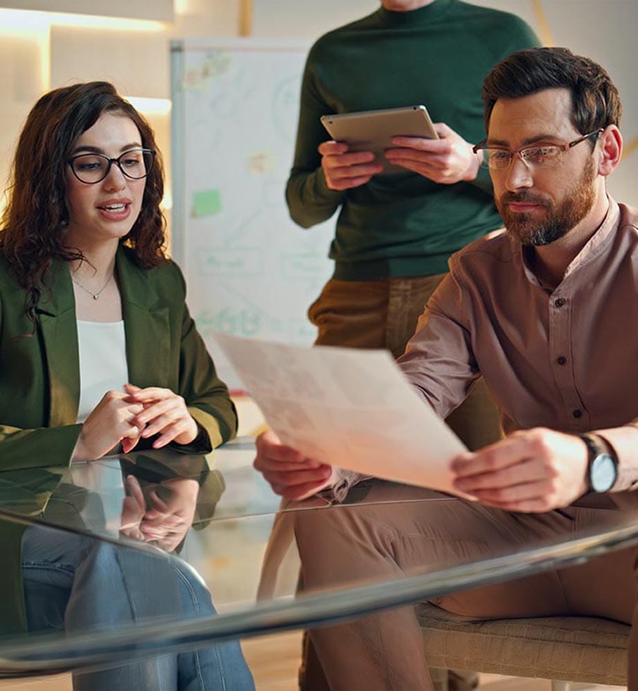 Recruiter consulting with a candidate around a meeting table